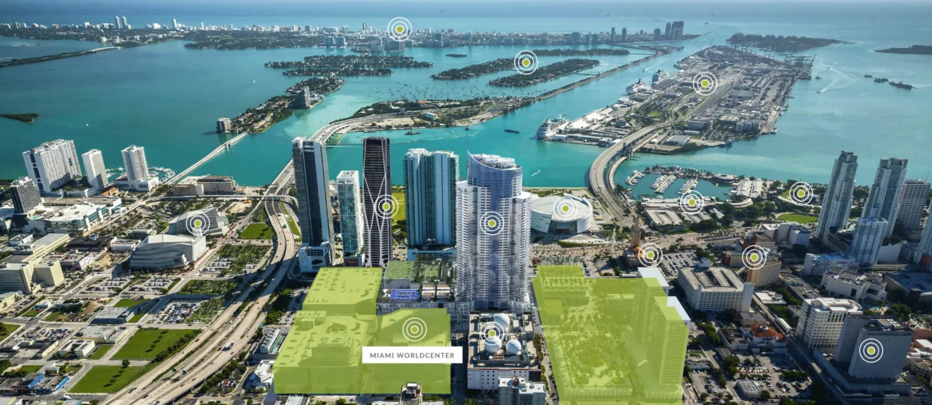 A coastal skyline featuring skyscrapers and bridges includes Paramount Miami Worldcenter