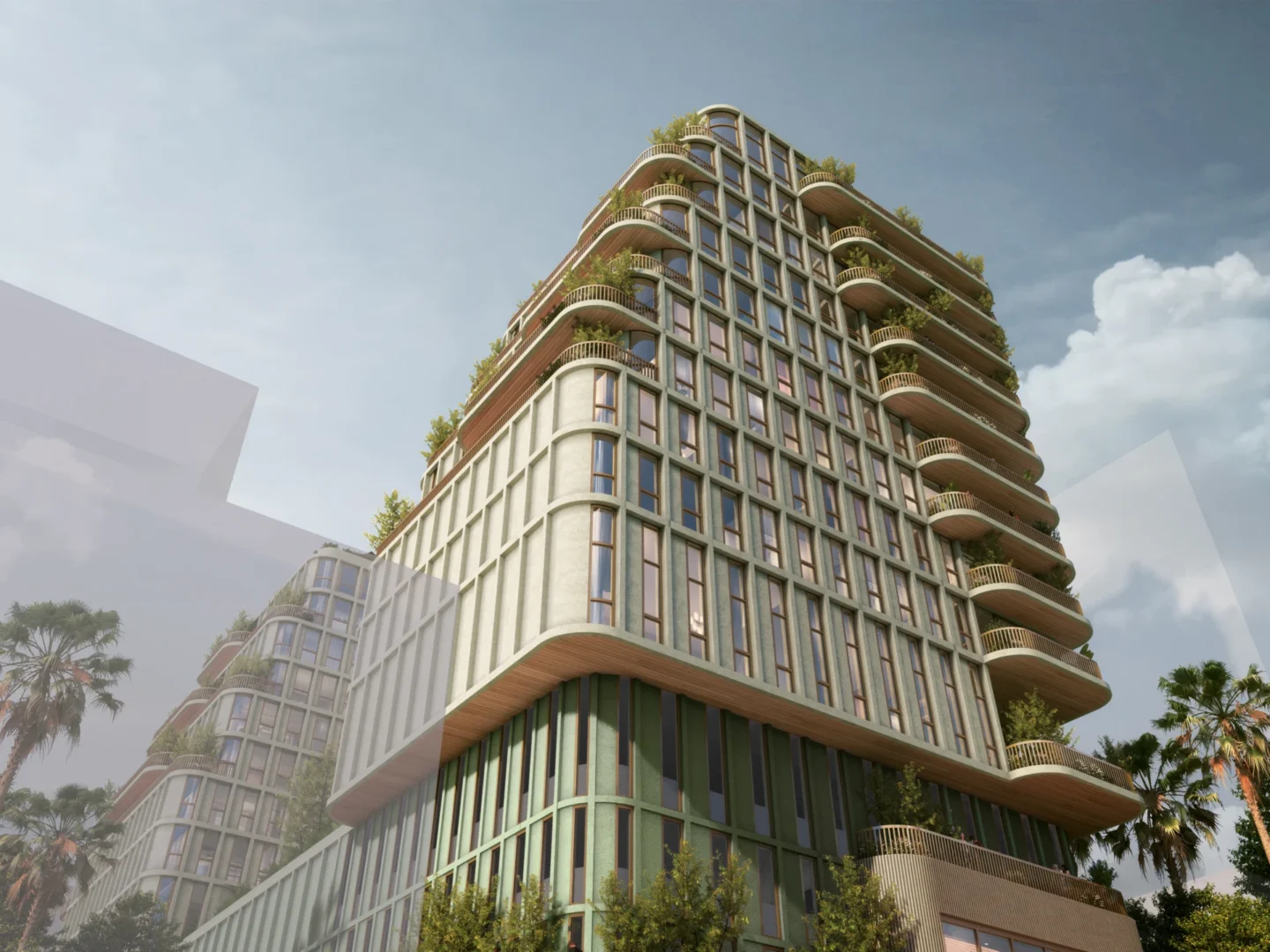 A multi-story building in Accardi Residences features balconies with greenery and palm trees under a cloudy sky