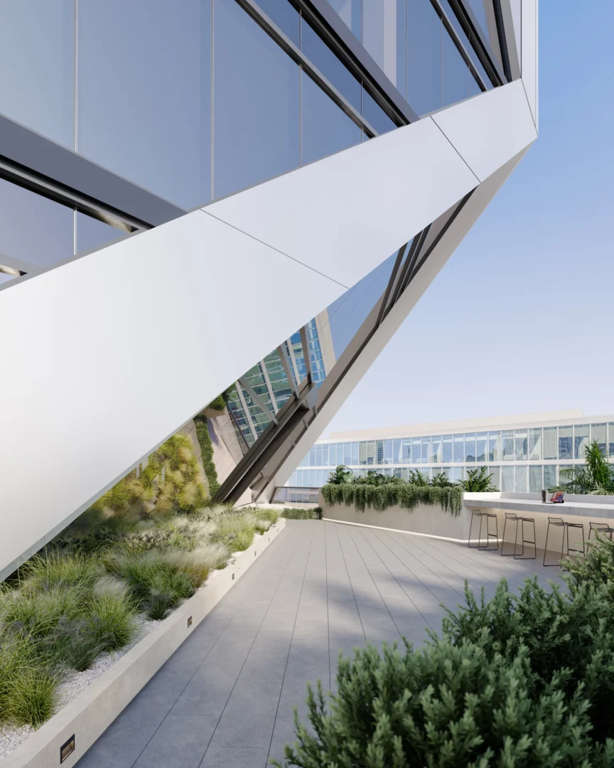An angular white structure overhangs a tiled terrace with greenery and an outdoor bar area in HUB Miami