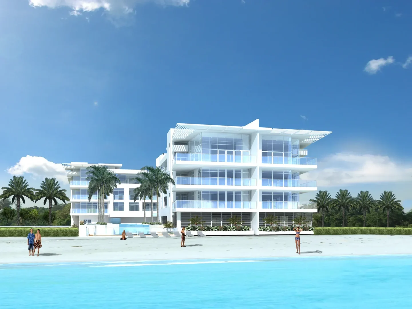 Los edificios blancos de varias plantas de Ice Condominiums, con terrazas acristaladas, se alzan junto a una playa con palmeras, aguas turquesas y gente.