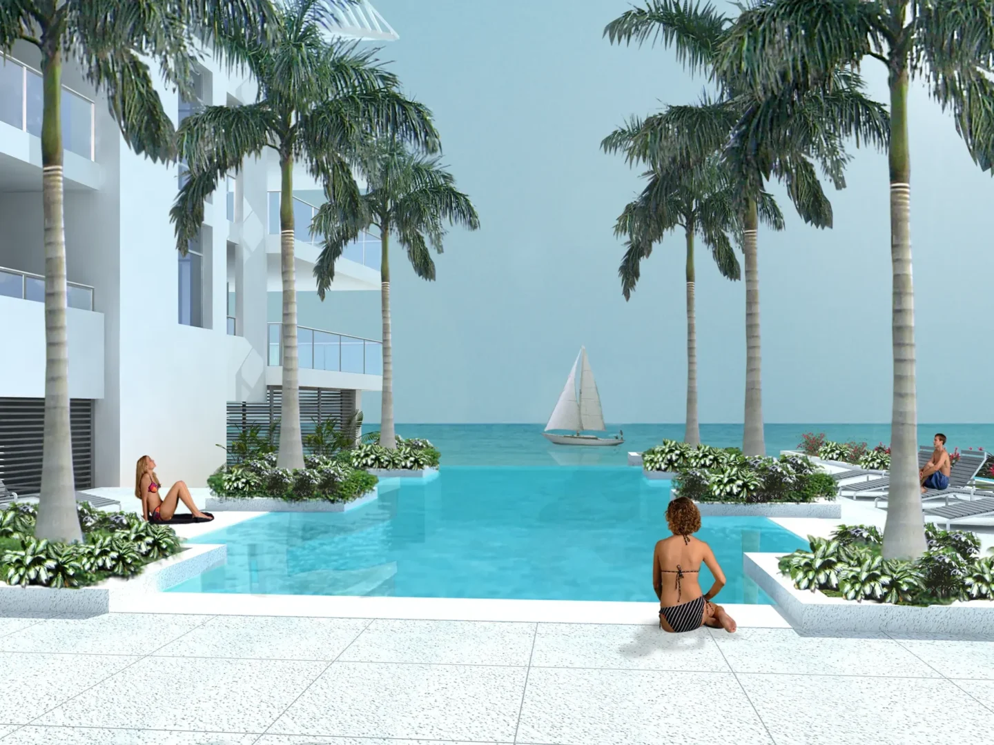 Las palmeras rodean la piscina y la terraza de Ice Condominiums, donde la gente se sienta junto a las tumbonas y a un velero que se encuentra en el agua