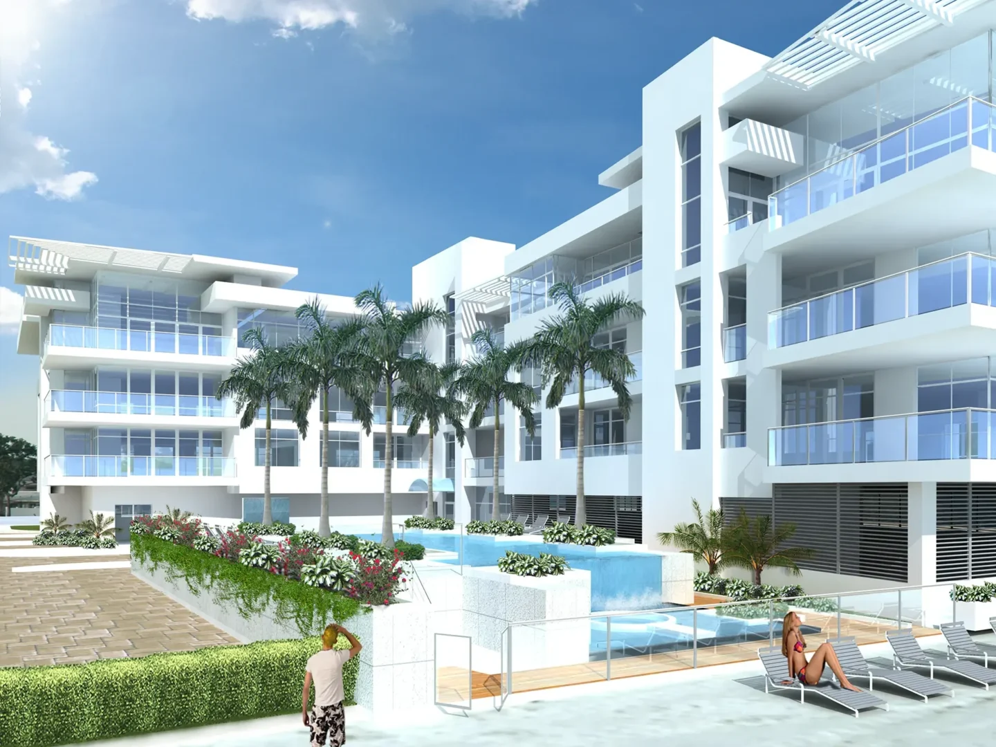 Los edificios blancos de varias plantas de Ice Condominiums cuentan con balcones, palmeras, una piscina y gente descansando o paseando.