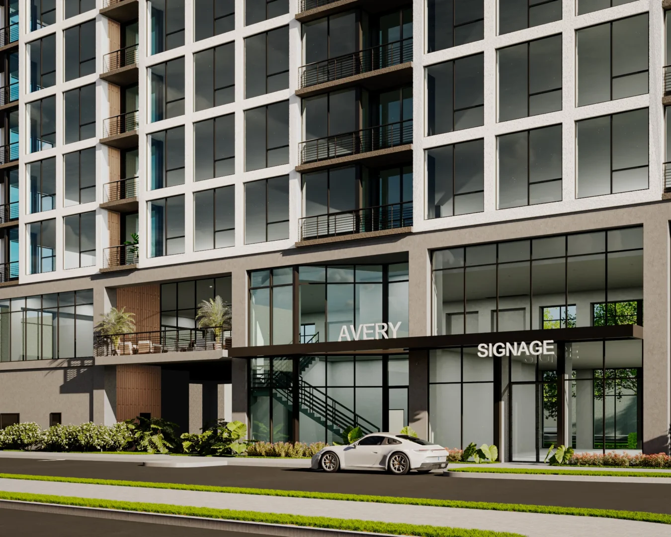 Multi-story glass windows and balconies of The Avery overlook a street with a white car, greenery, and an indoor staircase