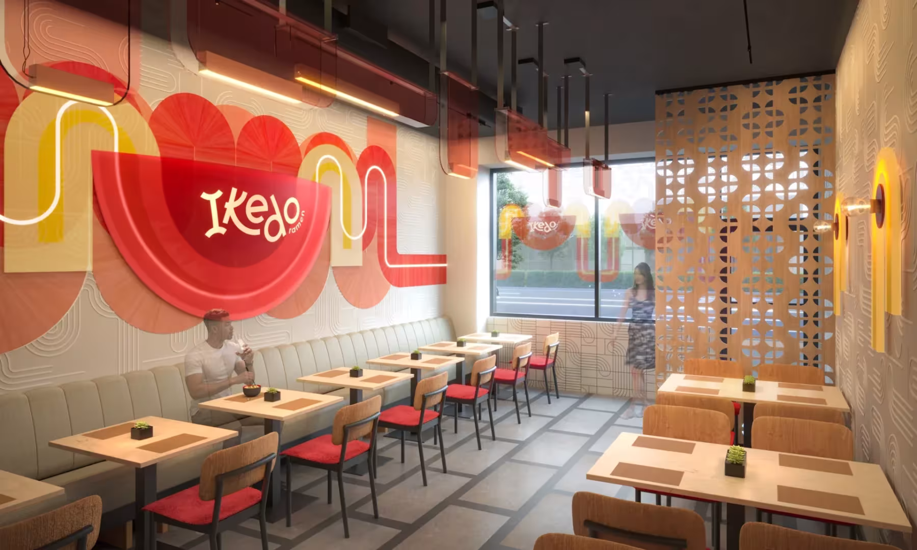 A large red and yellow graphic mural covers a wall in the Ikedo restaurant interior with dining tables, chairs, and people